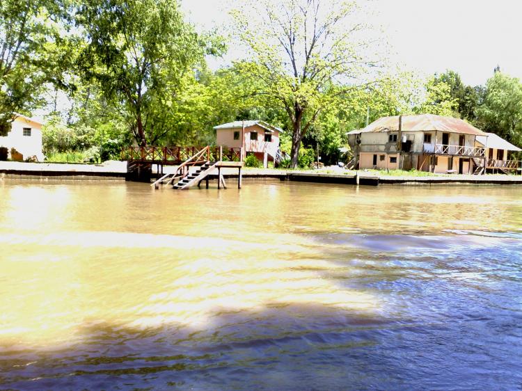 VENDO 4 CASAS  EN ISLA DEL TIGRE