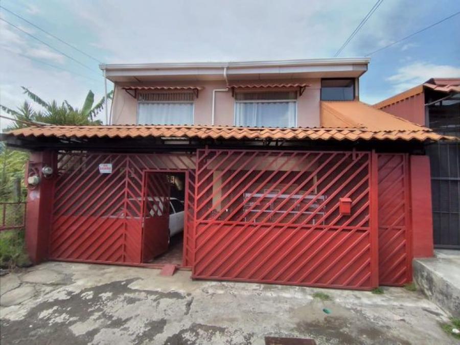 AGRACIADA Y LLAMATIVA CASA EN PROPIEDAD DE SAN ISIDRO DE HEREDIA CL22-676