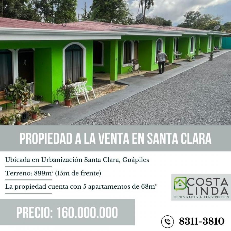 Terreno con 5 apartamentos a la venta en Guápiles