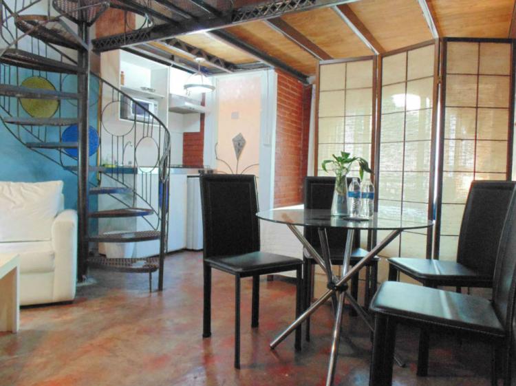 The Loft is furnished for rent with 2 bathrooms and excellent lighting.